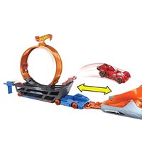 Вантажівка-транспортер Hot Wheels Круті трюки (GCK38)