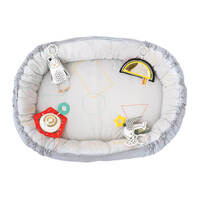 Розвиваючий музичний кокон з дугами Taf Toys Полярне сяйво 4-в-1 Затишне гніздечко
